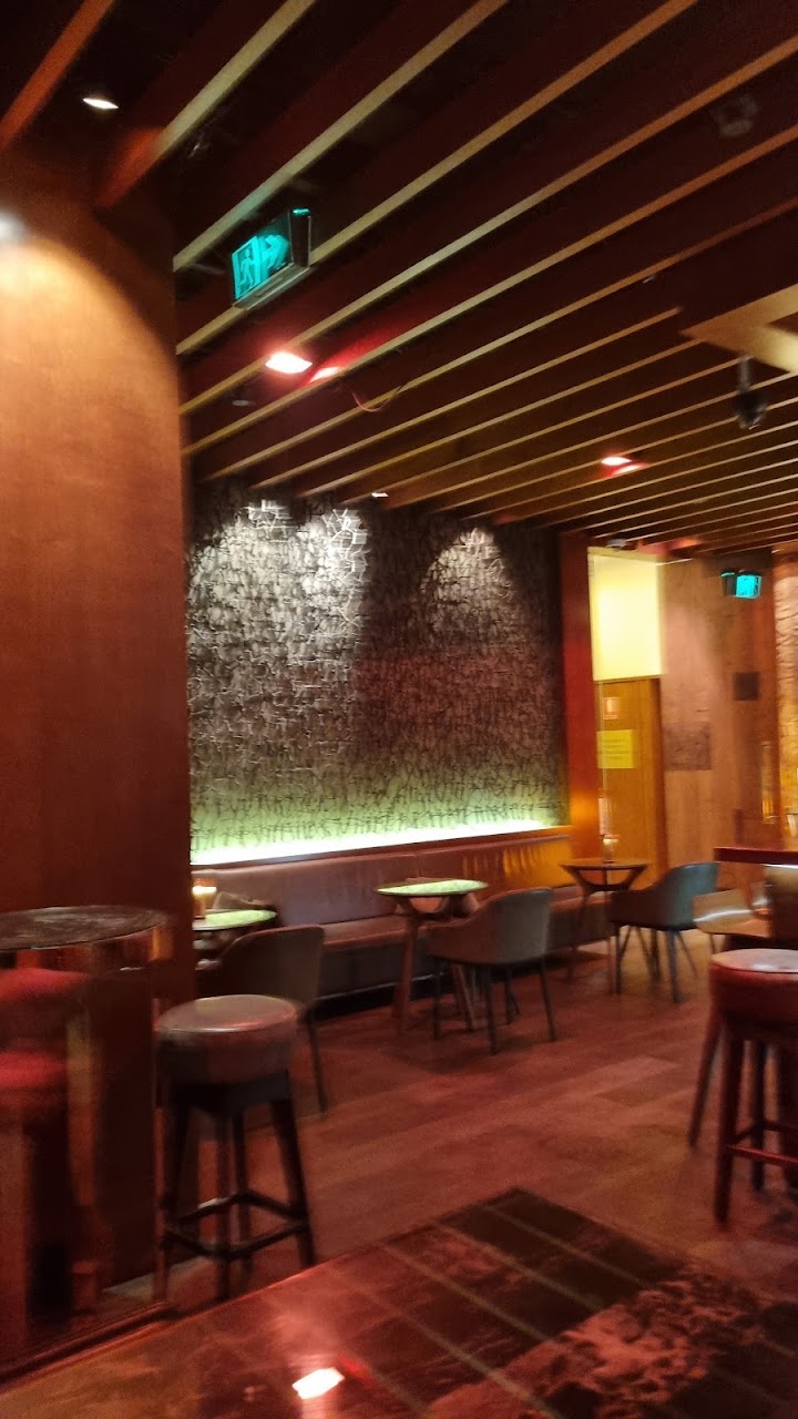 Warm timber seating inside Grain Bar