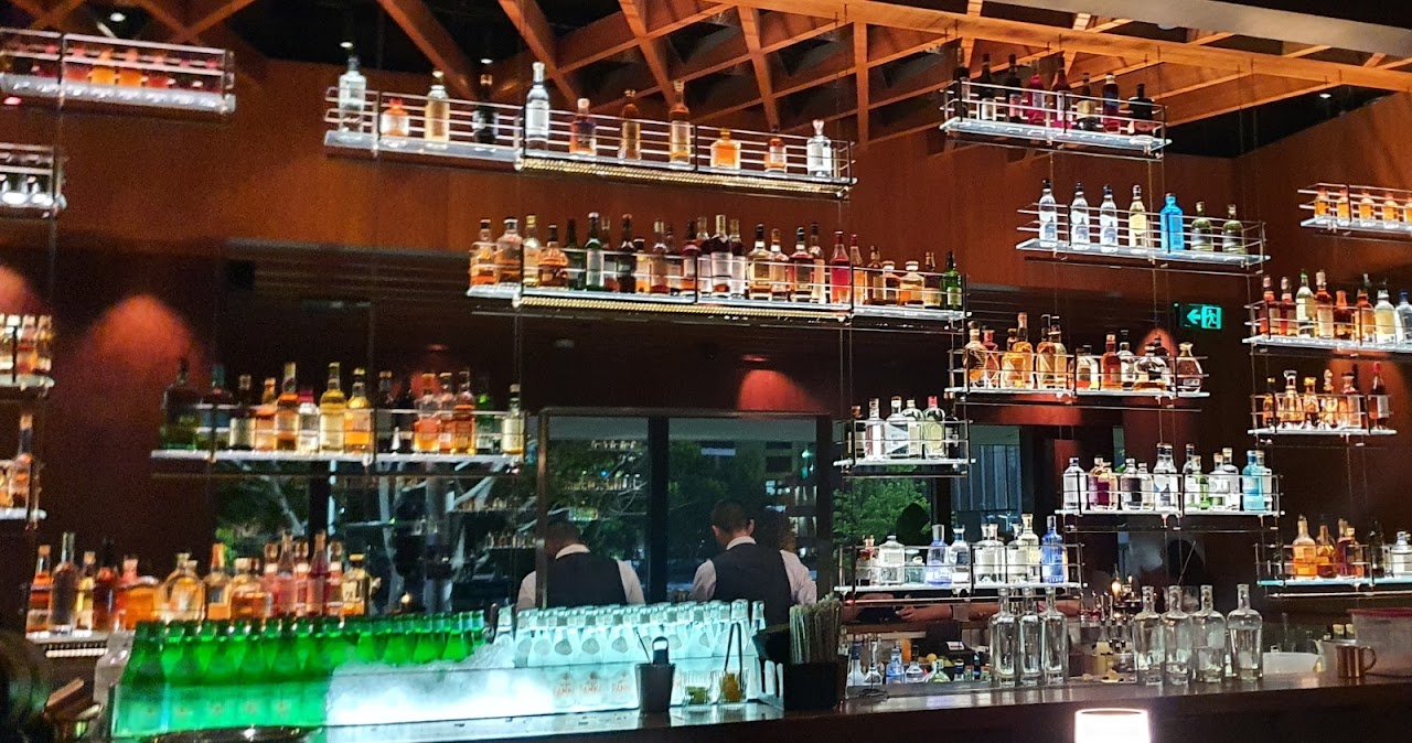 Back bar shelves lined with spirits at Grain Bar