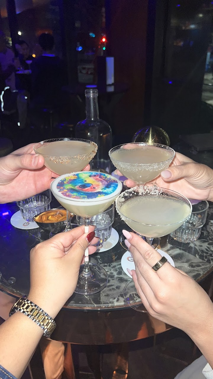 Guests raising cocktails at Grain Bar